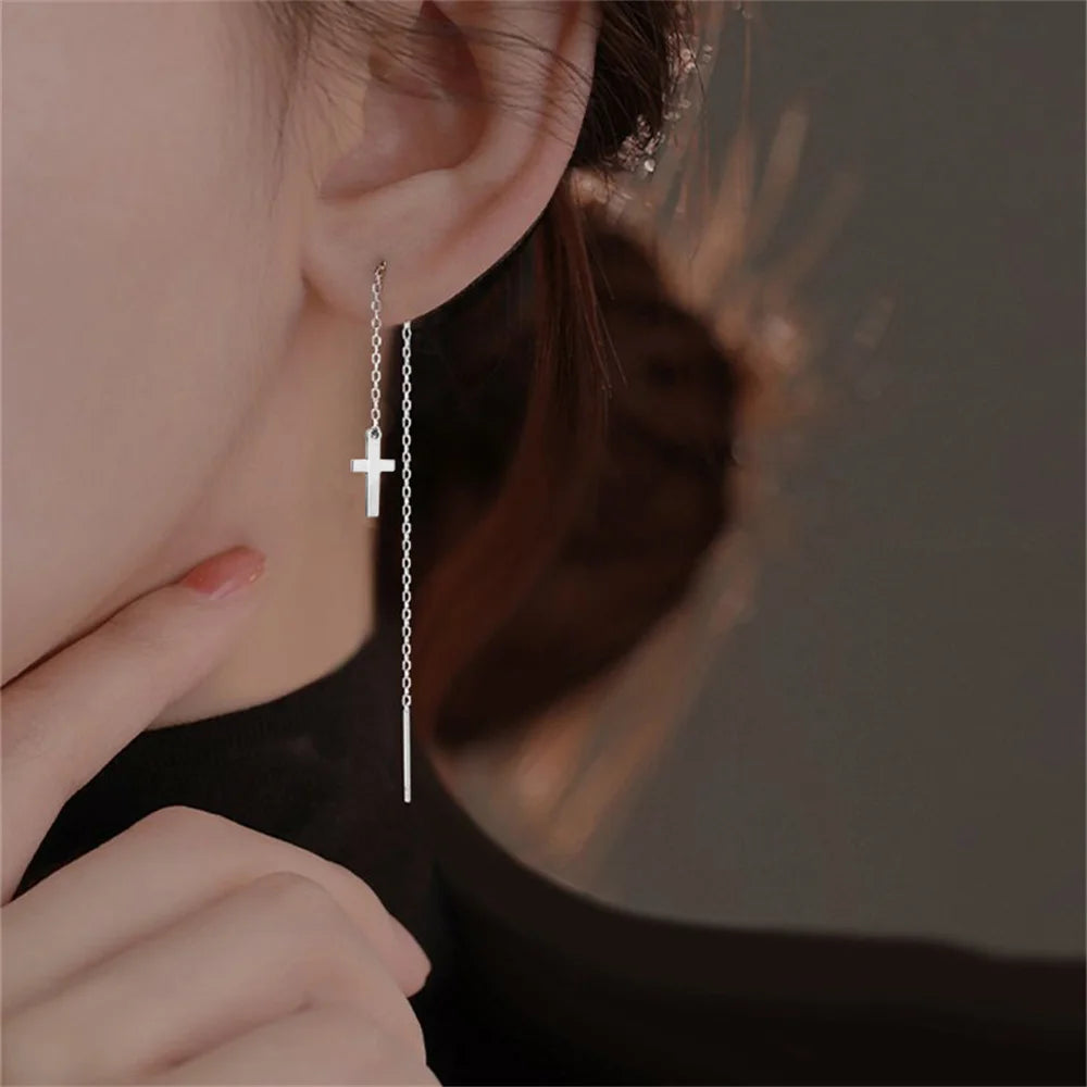 Boucle d’oreille croix