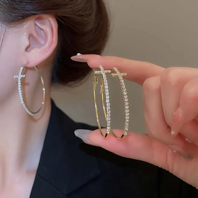 Boucle d’oreille croix