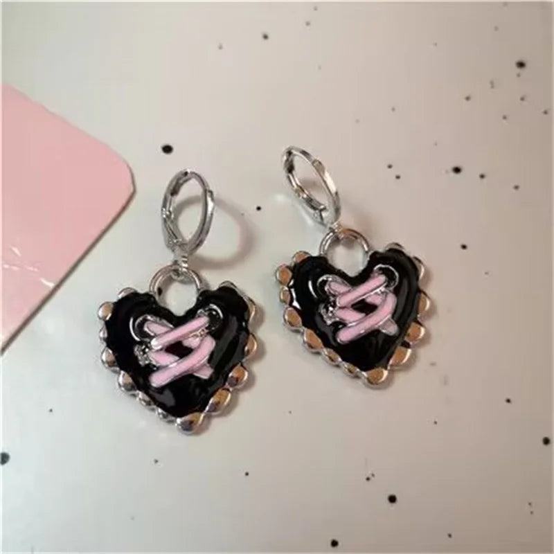Boucle d’oreille croix