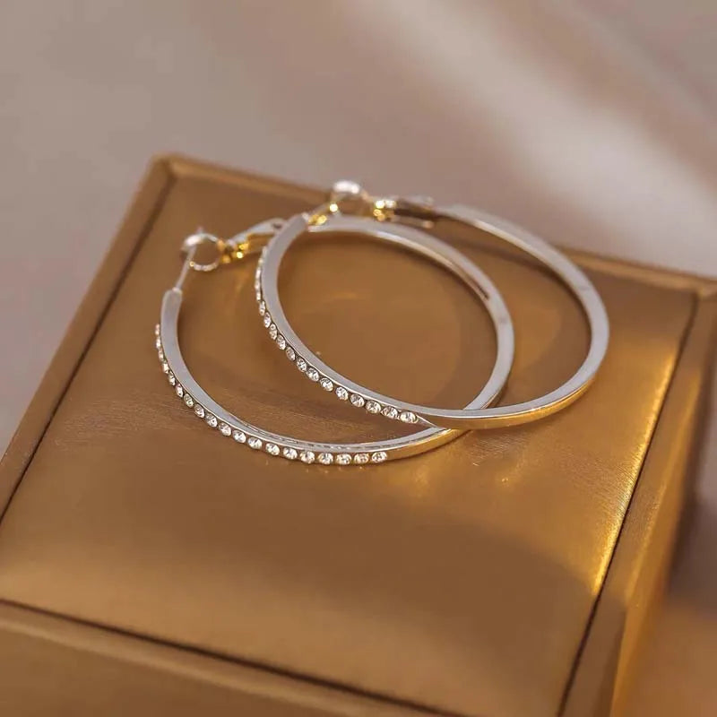 Boucle d’oreille croix