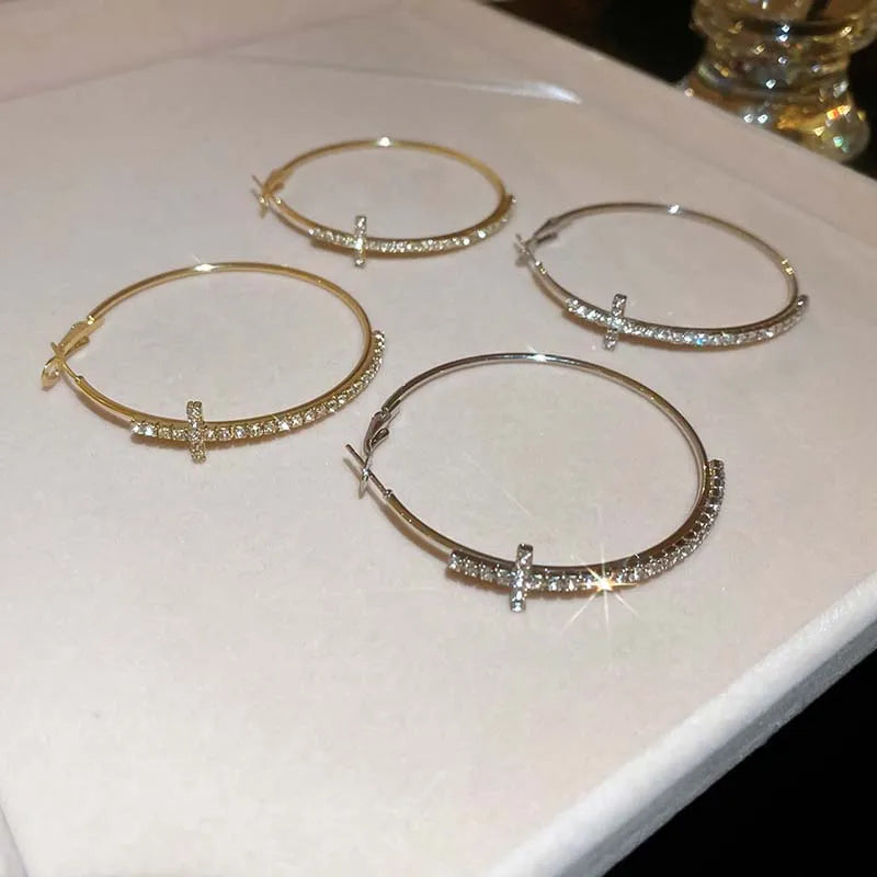 Boucle d’oreille croix