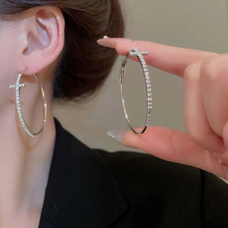 Boucle d’oreille croix