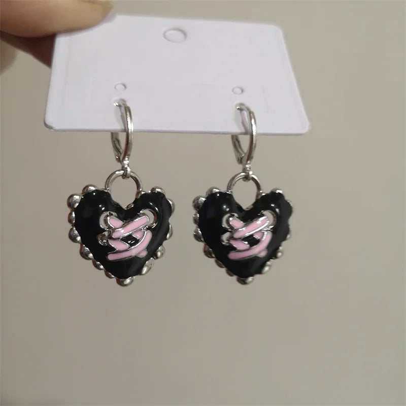 Boucle d’oreille croix