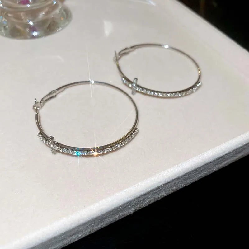 Boucle d’oreille croix