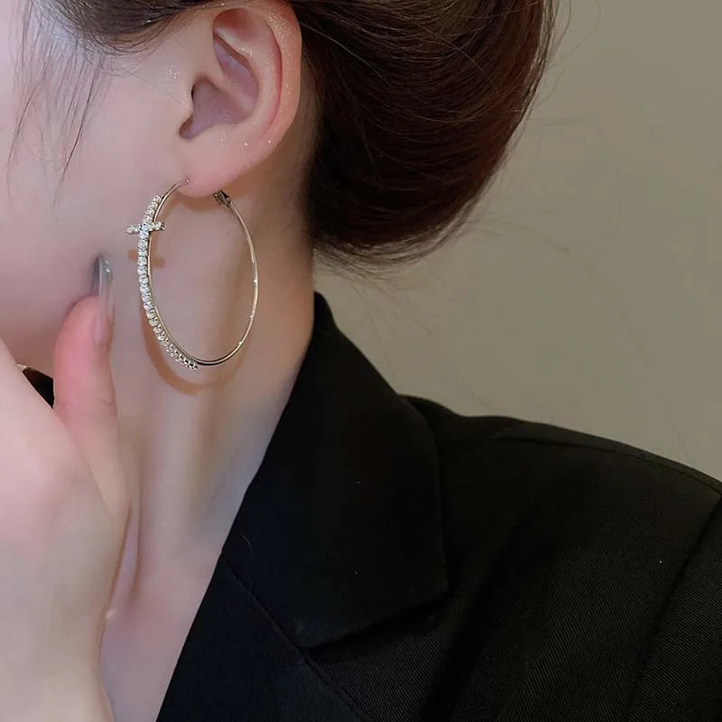 Boucle d’oreille croix